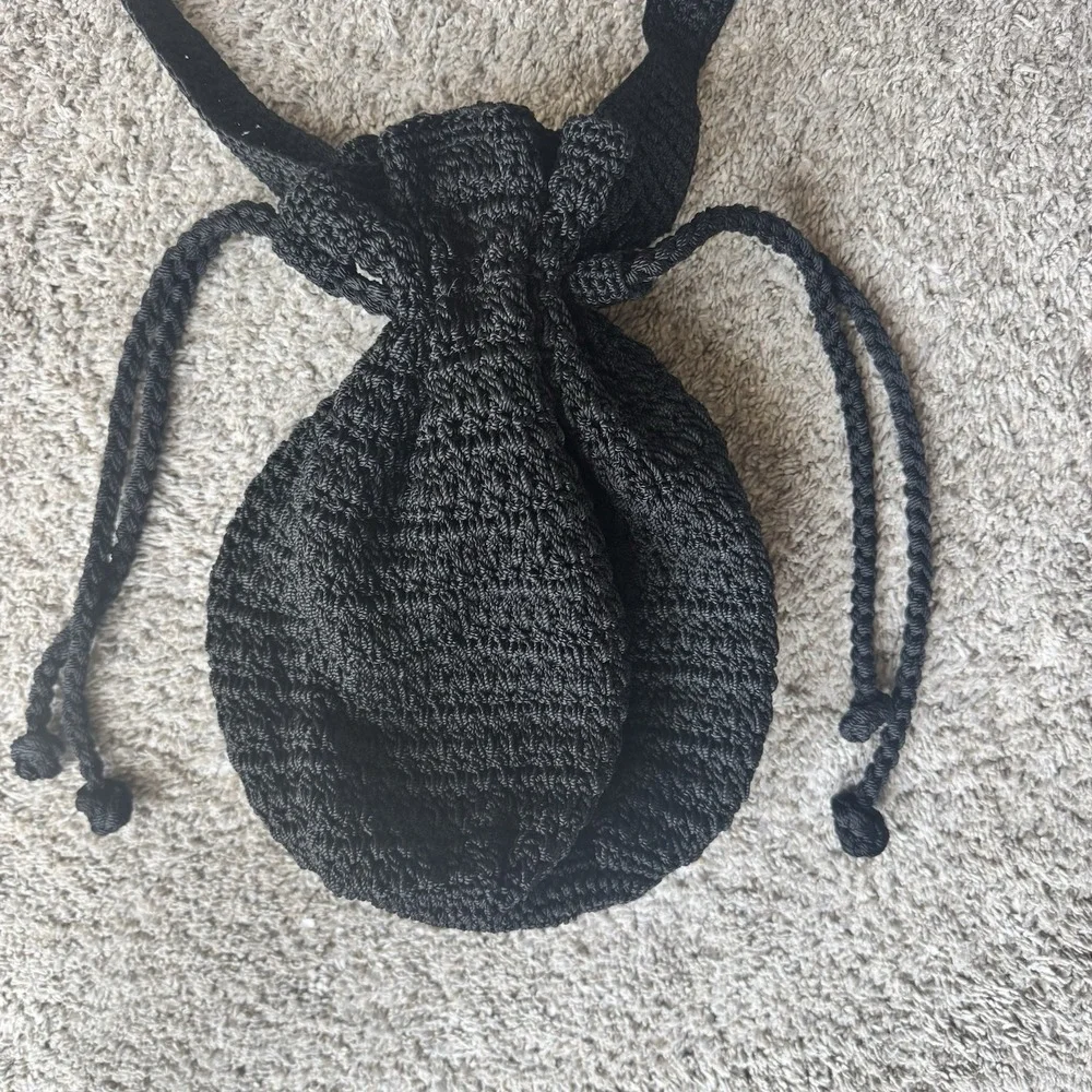 THE SAK Crochet Drawstring Purse Backpack Black Bucket Handbag Excellent